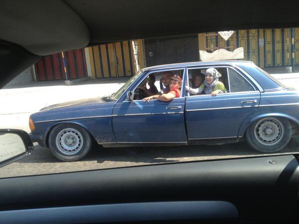 Michel_Jabbour's tweet photo. there are 4 people sitting in the front! Which is why the driver side door cannot be closed @cheyef7alak #Raw3a http://t.co/L8852XKiAU