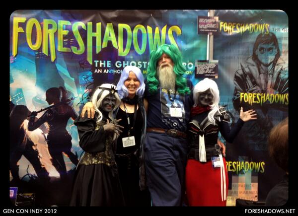 Foreshadows's tweet image. Green-haired #EdGreenwood with lavender-haired Ruth (@TheFiveWits) and a pair of drow. As seen at #GenCon1749