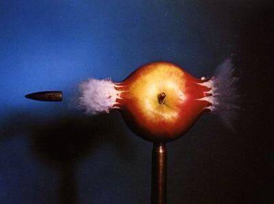 SlowMoPictures's tweet photo. A bullet going straight through an apple. http://t.co/eqBws6Nx8U