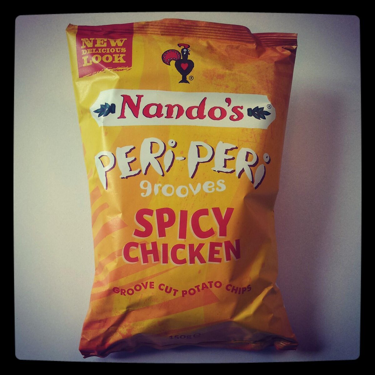 NandosUK's tweet photo. So groovy, you may feel like busting out the flares whilst tucking in! #NandosCrisps http://t.co/9O1nbNnkvq