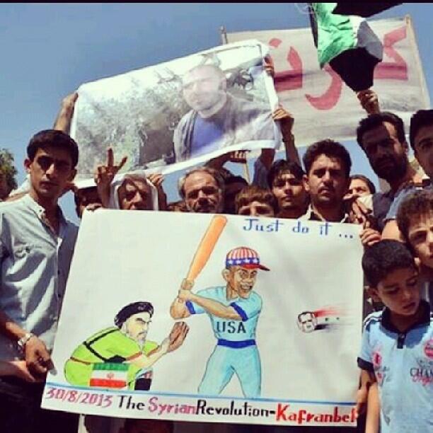 Die berühmten Plakatemaler aus Kafranbel zeichnen, was sie sich von Obama bezüglich Bashar al-Assads erhoffen