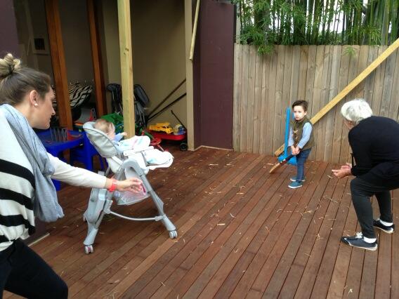 Mum bowling. High chair and #2 at silly mid off. Mum in law at short leg.
