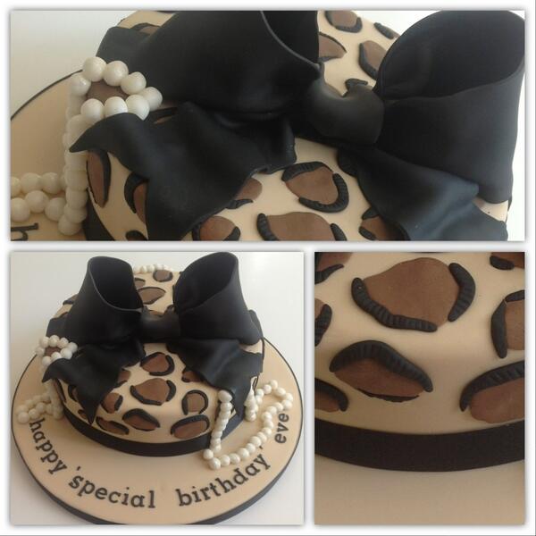 KWilliamsCakes's tweet photo. Love this leopard print design with icing bow http://t.co/rEUESbtL2w