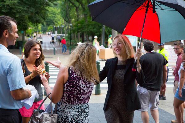 Penn's tweet photo. Getting rained on during #PennMoveIn, #Penn2017? No worries. Here comes President Gutmann with an umbrella. #LivePenn http://t.co/NVHMJkuRCo