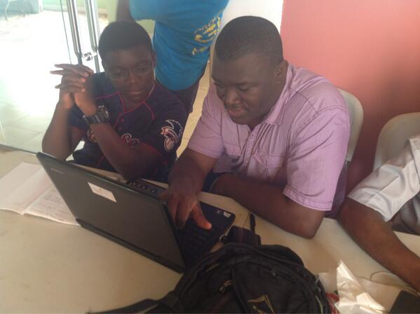PythonGhana's tweet image. Catch them young! @eokyere showing young Nana Kwame the ropes. #PATGhana