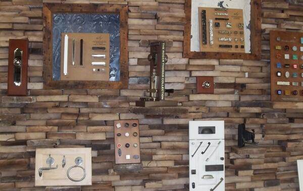 Commercial reclaimed wooden wall, made from the ends of boards. Displayed inside of Beam and Board Reclaimed Lumber.