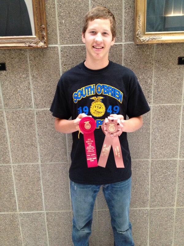 Brian Haden is all smiles after placing 8th individually at State meats!