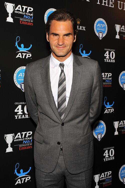 FedererNews's tweet photo. Going back to our man, only Roger Federer can carry a suit like this! He's simply the best! #foreverRFfan http://t.co/aoI7g6sUAp
