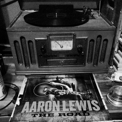 Aaronlewismusic's tweet photo. Levi’s enjoying The Road on vinyl. Any fans out there who prefer it on vinyl? | http://t.co/wgapXc6jRQ