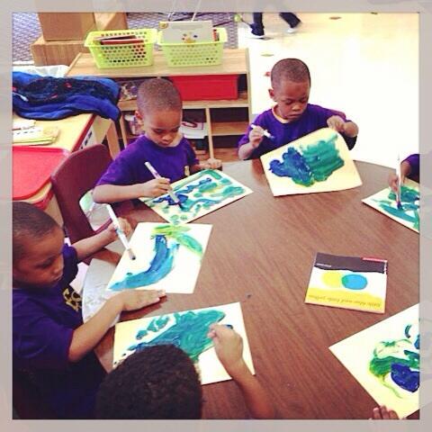 West End School Pre K boys mixing colors after reading,Little Blue and Little Yellow.
