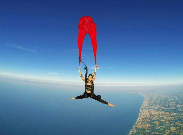 GoPro's tweet photo. Photo of the Day! No one does it quite like GoPro athlete @Roberta_Mancino . Bellissima! #skydive http://t.co/8zv1tCqUVe