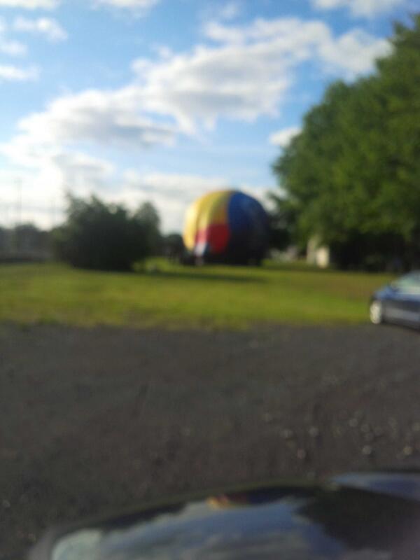 gregsviews's tweet image. Balloon lands safely in boy scouts of Canada on baseline road.