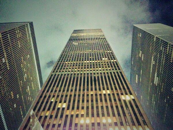 ravinarain's tweet photo. #rainclouds above #RockefellerPlaza. Pretty night. http://t.co/IA9AyCvkPn