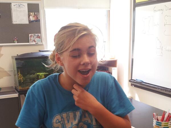 Lexi attempts to test the gummy bear capacity of her mouth without spewing them all over the room. Stand back!