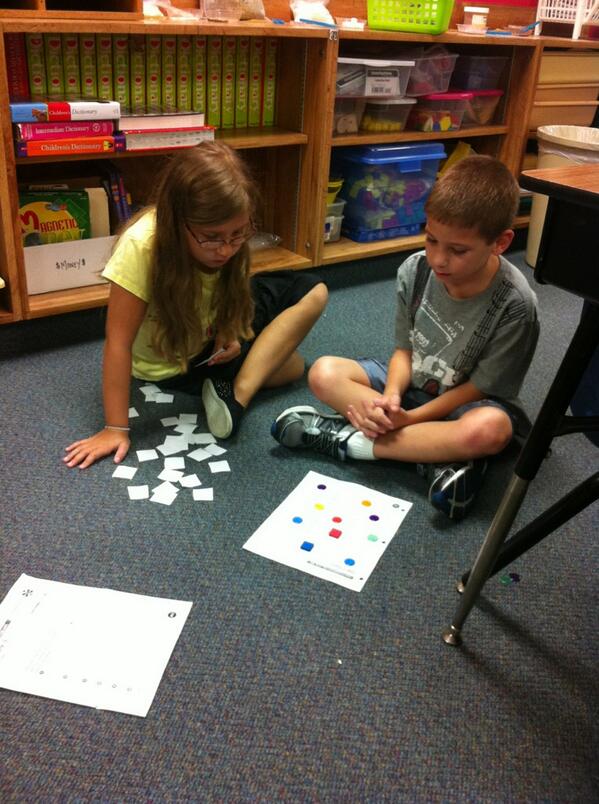 MsPhillips3's tweet photo. We are playing "Capture 5," a fun adding and subtracting game using a 100 chart! http://t.co/WSRl2aJW6F