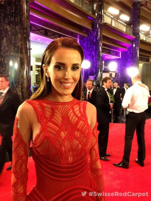 .<a href="/BecJuddloves/">Rebecca Judd</a> walks along the #SwisseRedCarpet