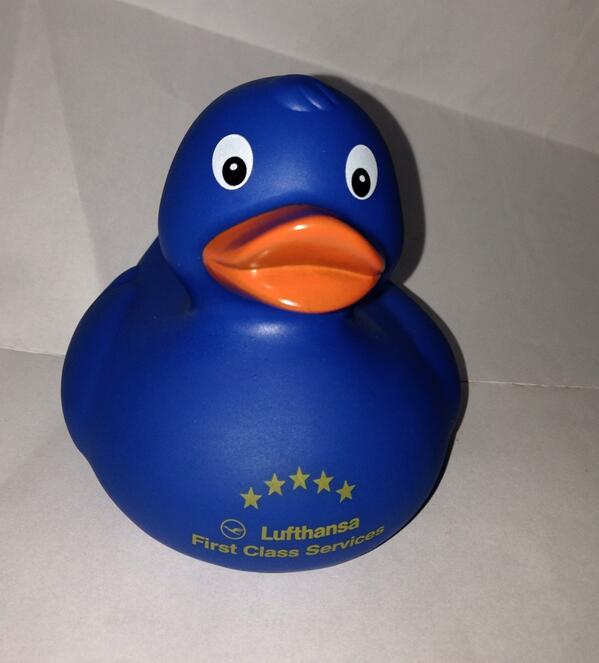 a blue rubber duck with a yellow beak