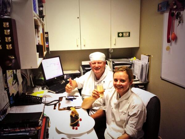 Jess, my assistant for Bocuse d'Or 21st birthday having some well earned cake and champagne