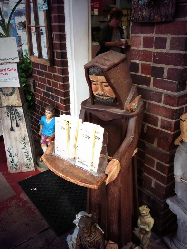 goldmange's tweet image. St Francis, holding menus for us upper middle class folks to eat at the cafe. #truehumility