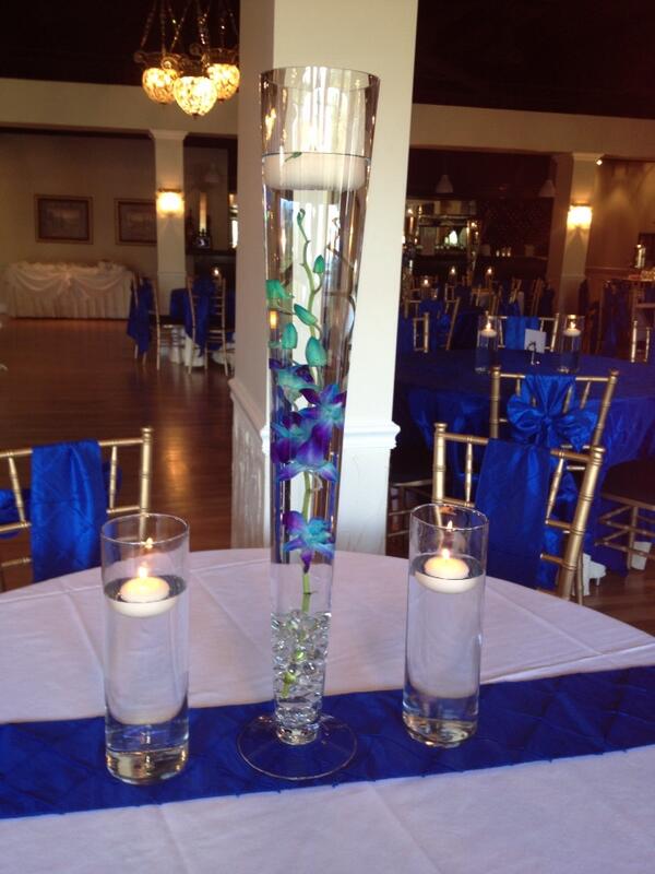 Julieluvsbrides's tweet photo. Submerged dendrobium orchids make a simple yet elegant centerpiece. We love working at the Roswell Mill Club http://t.co/ZFst5x1TBE