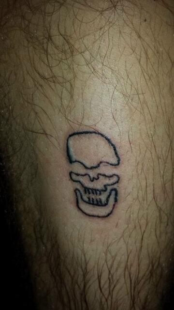 F_Omarion's tweet photo. @ConnorJSinclair jordan scanlons new tattoo! Think its a burger or a skull or something :s http://t.co/ZxtcrdltfC