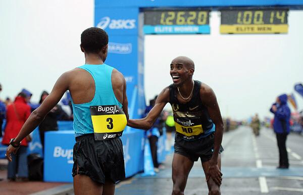 shieldsgazette's tweet photo. If ever a pic sums up sportsmanship it's this one of Mo Farah &amp; Bekele at the #GNR finish. Send us your pics #gazGNR http://t.co/04W3L694Z0