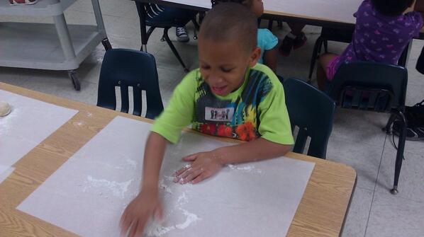FirstMetIDC's tweet image. One of our After School Students making Pretzels