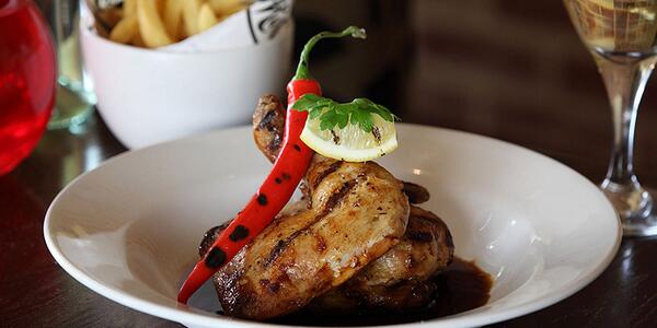 Half roasted lemon piri piri chicken and a fresh grilled red chilli for the brave! #fortheloveofsteak