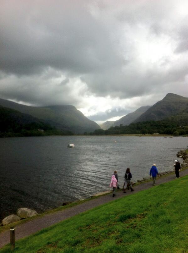 The scene at the finish. Dry roads, heavy clouds.
