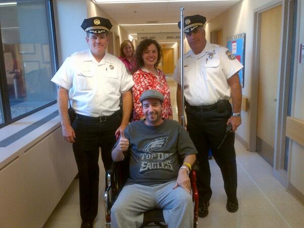 PPDChaplains's tweet photo. @PPDChaplains  Hero Philly cop Ofc. Edward Davies as he left hospital. Praise God!#Greatnews!!!     http://t.co/nNfM8X6kdW