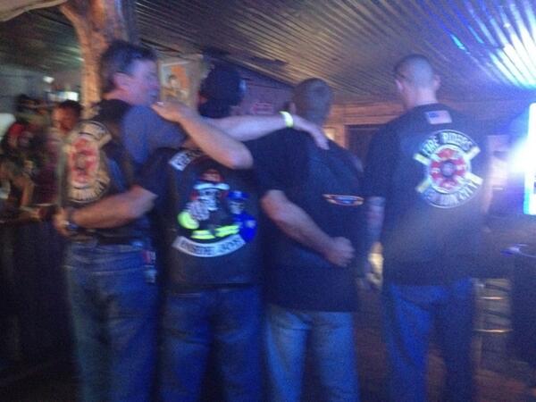 Ghostsof911's tweet image. Group hug. Fire Riders and Ghosts of 9/11 at Daytona.