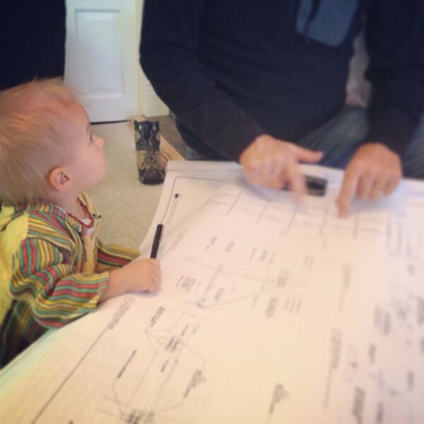 NWRaw's tweet photo. Elaithia looking over building plans with grandpa, making sure there's a spot for her chocolate almond milk  #nwraw http://t.co/0GLLkoSB6G