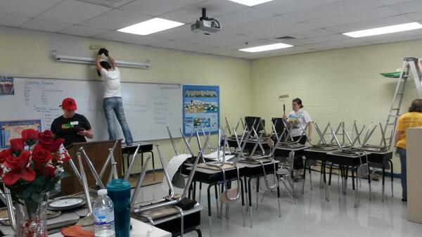 aredmo03's tweet image. #HONDay2013 @jerebaxterms volunteers revive the walls with paint.