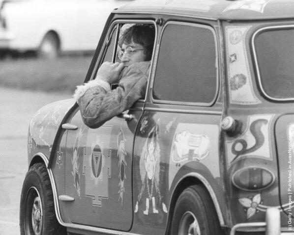 John Lennon in George Harrison's psychedelic painted Mini in Kent, 1967