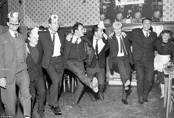 Tottenham Hotspur staff and players having a Christmas party in the club canteen, 1962