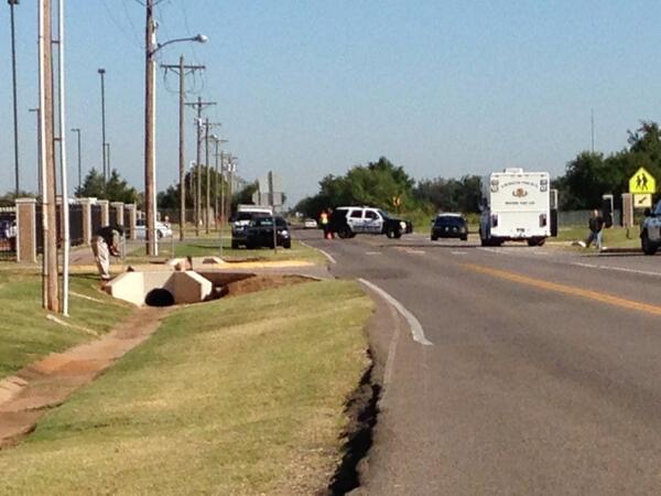 EdmondPD's tweet photo. Bomb squad X-raying a pkg we cannot identify outside of North HS. Thomas Dr is closed at the moment. http://t.co/HC8VWnJuoF