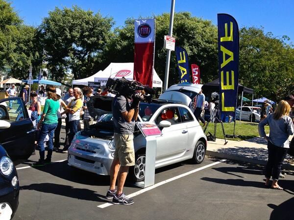 Teslarati's tweet photo. Media at #NPID2013 LA.  Great to see @FIATUSA , @NissanLeaf and @TeslaMotors representing a @PlugInAmerica nation! http://t.co/ekfCtn9mF7