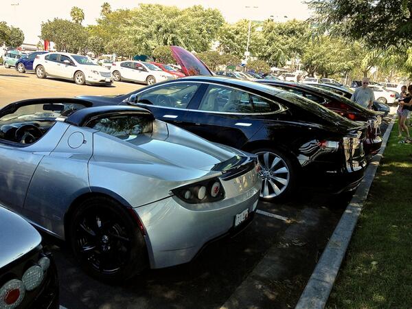Teslarati's tweet photo. Founders of #TESLIVE and the #TeslaMotorsClub showing their support at #NPID2013.  Stay tuned http://t.co/cWiAw8GRfo http://t.co/U0SnLB1ZAr