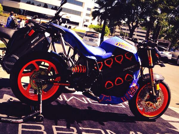 Teslarati's tweet photo. @BrammoSays all electric carbon fiber bike #NPID2013 http://t.co/7PrXzKKo3C