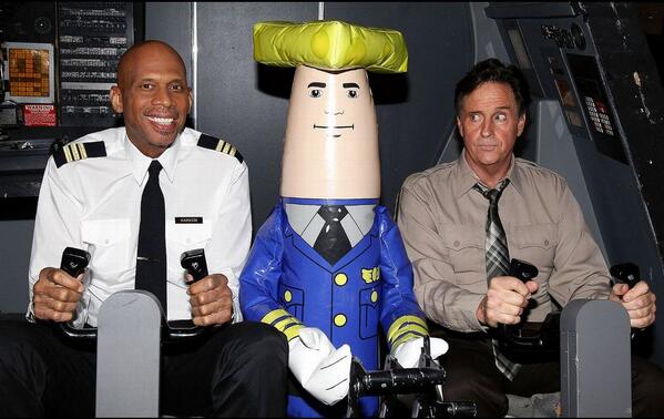 espn's tweet photo. Shirley, you can’t be serious. 

Kareem and the “Airplane!” cockpit crew … reunited 30 years later -> http://t.co/lclKHqtknD