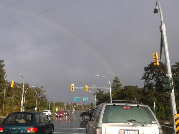 Nice rainbow made up for the rain on the 1st day back. Leaning over Mike to get the perfect angle.