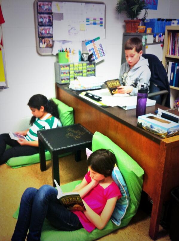 TrzcinskiJ's tweet photo. "Read anywhere" on Fridays. Even in your teacher's chair! http://t.co/VqkkPY2igL
