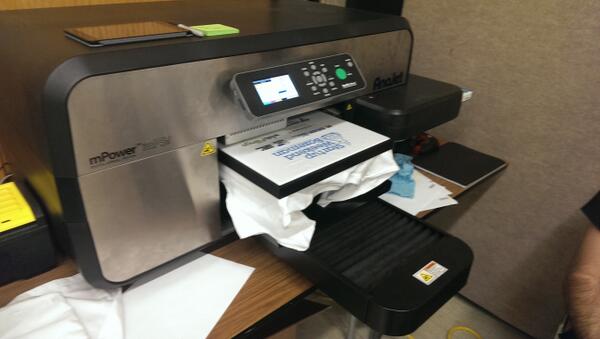 Dan_Cromer's tweet photo. This is basically a LaserJet printer for t shirts.  I may never buy a pre-made t-shirt again.  #swbozeman http://t.co/4eKJKdaqBR