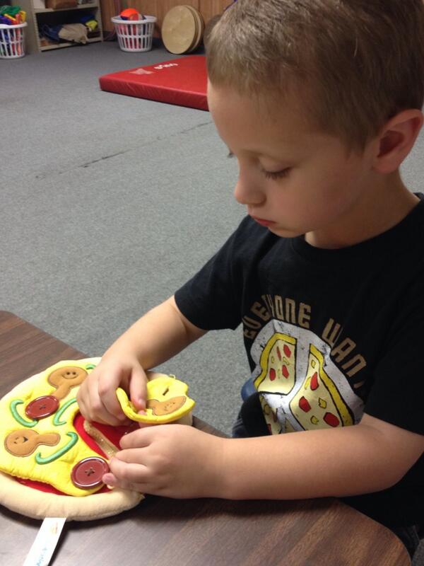 OTBISD's tweet image. Kevin's feeling a bit #cheesy about pepperonis today. #buttonfun