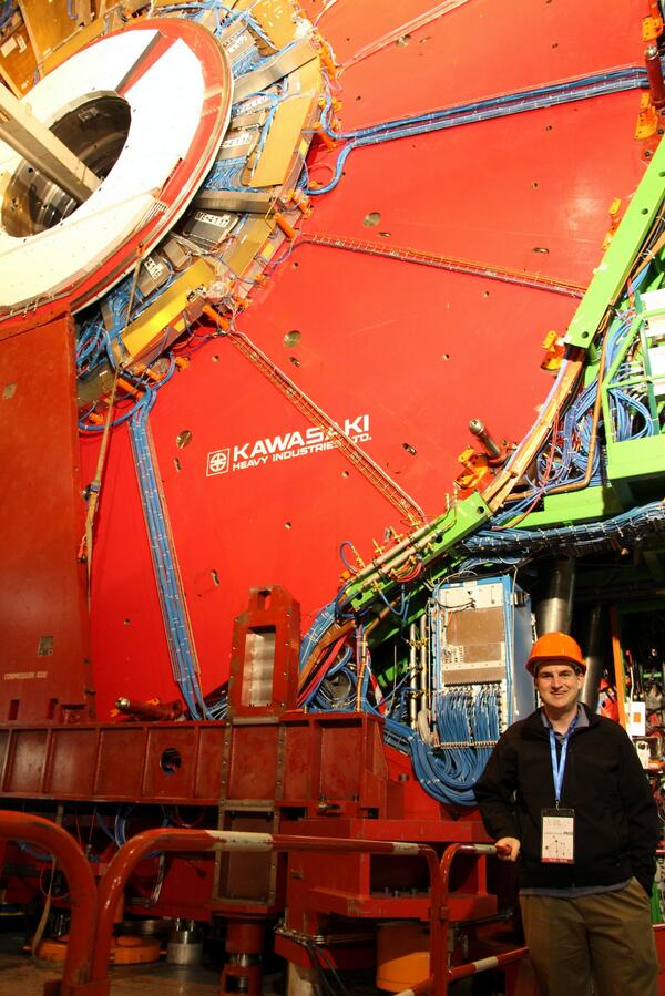 JamesMcNellis's tweet photo. Me, standing next to the @CMSExperiment of the Large Hadron Collider at @CERN. #OpenCERN13 was spectacular! http://t.co/tubSDf5G3R