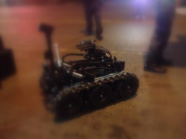 ABSCBNNews's tweet photo. PHOTO via @zhandercayabyab: EOD robot used in inspection of suspected bomb threat in Pasay http://t.co/b32MIv9gqx