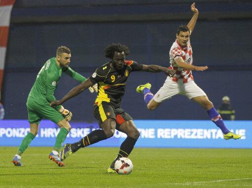 Everton's tweet photo. PHOTO: @RomeluLukaku9 nets one of his two goals tonight that clinched World Cup qualification for Belgium. #EFC #WCQ http://t.co/xJJSWlAvKF