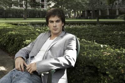 -Sits outside upon a chair,breathing in the fresh air,signing a rested-
