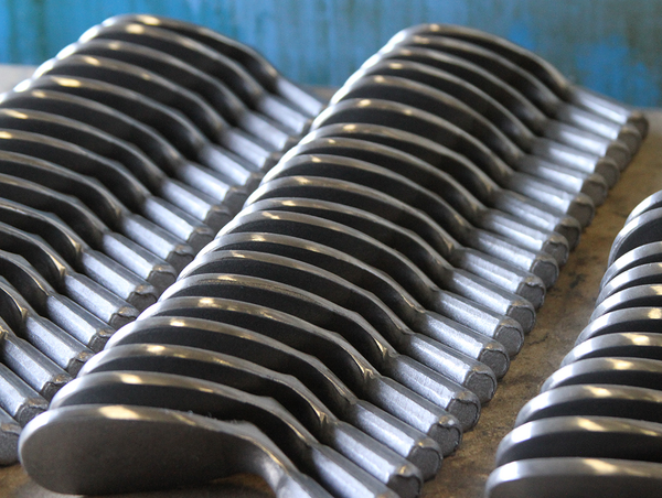kronusgolf's tweet photo. Line 'em up. Some fresh JK-1 Series Forged wedges start their journey. #MadeinUSA #Golf http://t.co/4SHqUqweBz