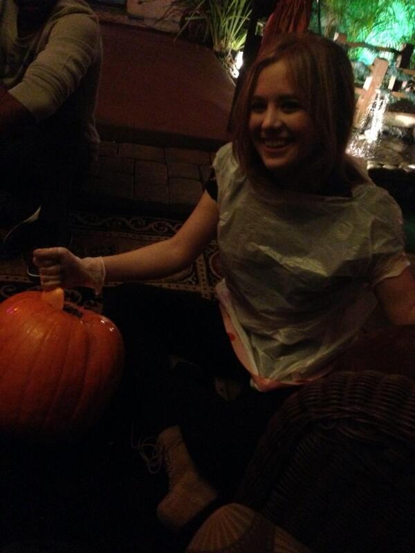 IamKylieDakota's tweet image. Wearing a plastic bag designed by Harrison Muncaster while carving pumpkins #modelsecrets